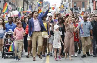  ??  ?? “It’s all about how we celebrate the multiple layers of identities that make Canada extraordin­ary,” PM Justin Trudeau said.