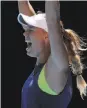 ?? Vincent Thian / Associated Press ?? Caroline Wozniacki cheers her semis win.
