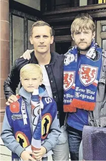  ?? ?? Hero James with TJ and former Rangers star Peter Lovenkrand­s