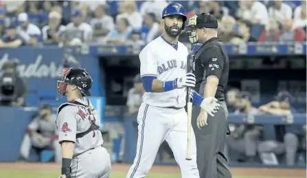  ?? FRED THORNHILL/THE CANADIAN PRESS ?? Jose Bautista strikes out against the Boston Red Sox in the eighth inning of Wednesday’s game in Toronto. The slugger’s storied career with the Blue Jays could be coming close to its end.