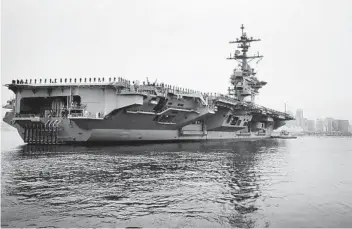  ?? HOWARD LIPIN U-T FILE ?? In 1973, the Navy aircraft carrier Carl Vinson was named after the influentia­l Georgia legislator who was also a proponent of racial segregatio­n. The ship was launched in 1980.