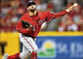  ?? JAMIE SABAU / GETTY IMAGES ?? Lefty Oliver Perez, who pitched in 114 games the past two seasons for the Nationals, is expected to take a late-inning role in the Reds’ bullpen.