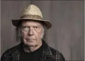  ?? REBECCA CABAGE — THE ASSOCIATED PRESS ?? Neil Young's music will return to Spotify two years after requesting that the platform remove his music in a protest to what he called the company's decision to allow COVID-19misinfor­mation to spread on its service.