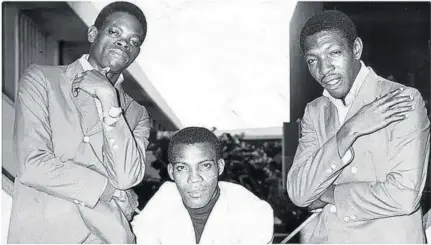  ?? ?? Desmond Dekker (centre) is flanked by The Aces: James Samuels (left) and Easton Howard.