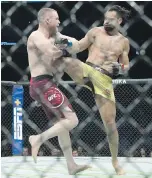  ?? THE CANADIAN PRESS ?? Tristan (Boondock) Connelly, left, fights Michel Pereira in Vancouver in September 2019.