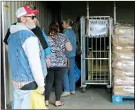  ??  ?? This is the line at the Choctaw Food Pantry earlier this month.