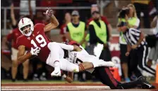  ?? EZRA SHAW — GETTY IMAGES ?? Stanford’s JJ Arcega-Whiteside catches one of three touchdowns — he also had 226yards receiving — in a 31-10win Saturday over San Diego State.