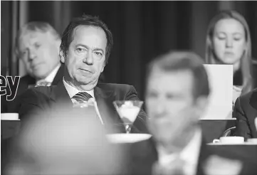  ??  ?? Paulson, president of Paulson & Co., listens at the Economic Club of New York in New York on Nov 20, 2012. — WP-Bloomberg photo