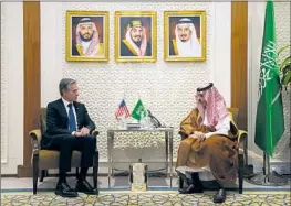  ?? Jacquelyn Martin Pool Photo ?? SECRETARY of State Antony J. Blinken, left, meets with Saudi Foreign Minister Prince Faisal bin Farhan at the Ministry of Foreign Affairs in Riyadh in October.