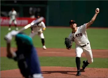  ?? AP Photo/D. Ros Cameron ?? San Francisco Giants starting pitcher Tyler Anderson (31) delivers a pitch against the Seattle Mariners during the first inning of a baseball game, on Thursday in San Francisco.