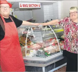 ?? Picture: Chris Davey FM4838561 ?? Tony and Susan Killingbec­k at TK Meats which has opened in Asford High Street