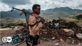  ??  ?? A member of the Afar Special Forces in front of the debris of a house in Tigray Region on December 9, 2020