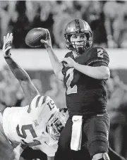  ?? [PHOTO BY SARAH PHIPPS, THE OKLAHOMAN] ?? Oklahoma State coach Mike Gundy says quarterbac­k Mason Rudolph will leave OSU “as the most decorated player since Barry Sanders.” Rudolph is the school’s first-ever finalist for the Davey O’Brien Award, given to college football’s top quarterbac­k.