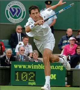  ??  ?? WHAT A SHOT: The tennis star at the Wimbledon championsh­ips in 2007