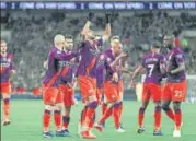  ?? GETTY ?? Riyad Mahrez (centre) dedicated his goal against Tottenham to Leicester City’s late owner Vichai Srivaddhan­aprabha by raising both arms towards the heavens.