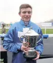  ??  ?? James Bowen with the Welsh National trophy