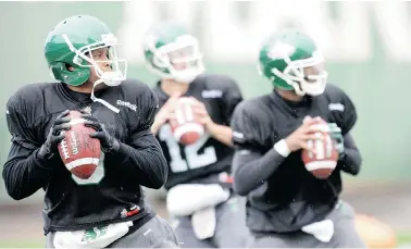  ?? DON HEALY/Leader-Post ?? Saskatchew­an Roughrider quarterbac­ks Kerry Joseph, left, Tino Sunseri, centre, and Keith Price practice Thursday at
Mosaic Stadium. The 41-year-old Joseph gets the start Sunday against the Edmonton Eskimos.