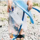  ??  ?? BEACH CLEAN UP: Wessa is cleaning up a section of the beachfront near the beacon in Summerstra­nd on Saturday morning