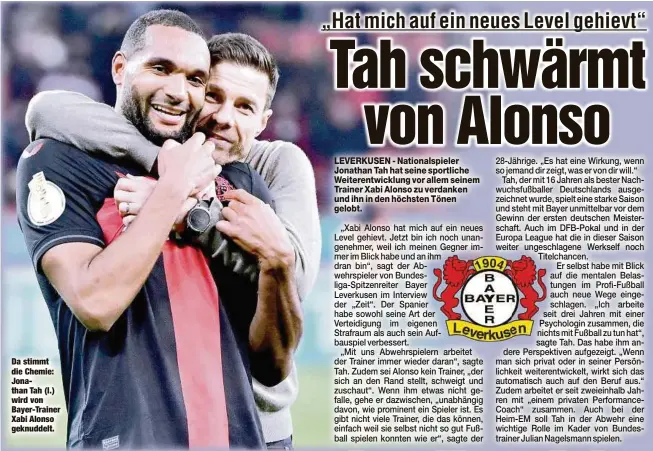  ?? ?? Da stimmt die Chemie: Jonathan Tah (l.) wird von Bayer-Trainer Xabi Alonso geknuddelt.