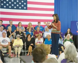  ?? MEG KINNARD/AP ?? Republican presidenti­al candidate Nikki Haley speaks at a campaign event in Iowa. Haley recently called the Senate “the most privileged nursing home in the country.”