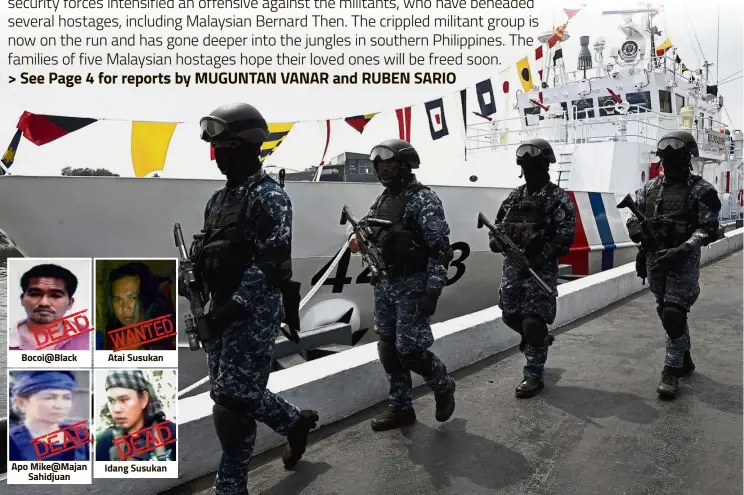  ??  ?? Bocoi@Black Apo Mike@Majan Sahidjuan Atai Susukan Idang Susukan
New hardware: A Philippine coast guard anti-terrorism unit passing by ‘BRP Malapascua’ – a newly commission­ed multi-role response vessel – in Manila. The vessel will be deployed to Sulu...