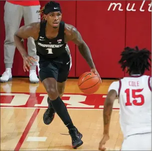  ?? Photo courtesy of PC Athletics ?? Greg Gantt (1) and Providence played well in the first half Wednesday night against St. John’s, but the Friars’ defense fell apart in the second half of an 81-67 Big East road defeat.