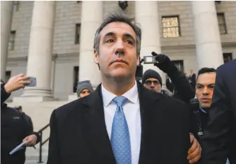  ?? Julie Jacobson / Associated Press ?? Michael Cohen, President Trump’s ex-lawyer, leaves federal court in New York after pleading guilty to lying to congressio­nal committees about a project Trump was working on in Russia.