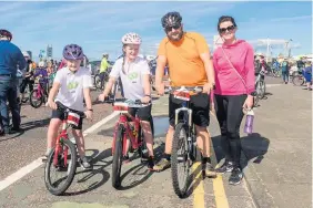  ??  ?? In the saddle The Priestleys - Freya, sister Layla and mum and dad Rob and Lois