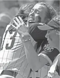  ?? MIKE CARDEW/AKRON BEACON JOURNAL ?? Watkins Memorial's Jordyn Wycuff, right, has signed with Ohio University.