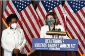  ?? Anna Moneymaker / New York Times ?? “This bill leaves no victim behind,” said Rep. Sheila Jackson Lee of Houston, joined by House Speaker Nancy Pelosi ahead of Wednesday’s vote.