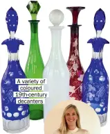  ??  ?? A variety of coloured 19th-century decanters