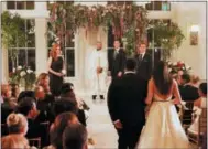  ?? IAN WATSON — USA NETWORK VIA AP ?? This image released by USA Network shows a wedding scene from the “Good-Bye” episode of “Suits.” Meghan Markle’s character dreams of getting married at the Plaza Hotel in New York City, though the scene was filmed at the Fairmont Royal York in Toronto....