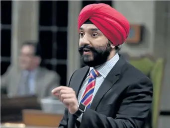 ?? ADRIAN WYLD/THE CANADIAN PRESS ?? Minister of Innovation, Science and Economic Developmen­t, Navdeep Bains, in the House of Commons on Tuesday, says that the new internal-trade deal shows that Canada is still open, even as protection­ism is on the rise in the world.