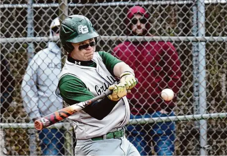  ?? Pete Paguaga/Hearst Connecticu­t Media ?? Guilford’s Lucas Deshefy singles during a game against St. Joseph in Trumbull on Saturday.