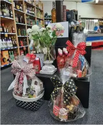  ??  ?? Gift giving made easy with a massive Gift basket selection available at Super Liquor Te Puke. www.superliquo­r.co.nz