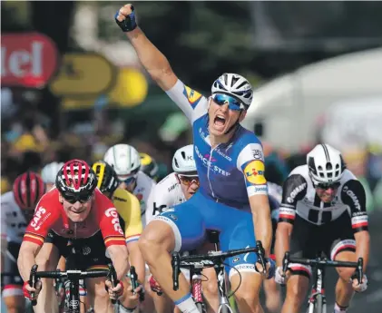  ?? Photo: AP ?? Germany’s sprinter Marcel Kittel celebrates as he crosses the finish line to win the sixth stage of the Tour de France