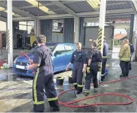  ??  ?? Cheshire Fire Cadets helping firefighte­rs by rolling up their sleeves for the Fire Fighters Charity