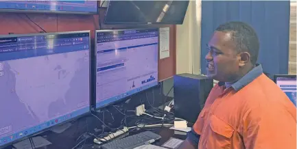  ?? ?? A technical assistant observes earthquake activities at the Seismology section of the Ministry of Lands and Mineral Resources office in Nabua