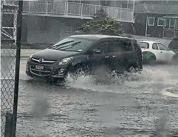  ??  ?? The majority of the flooding occurred on the main street of Te Awamutu.