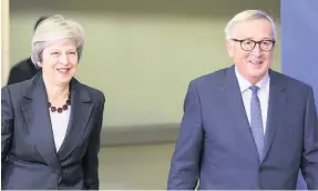  ?? ?? Brexit bother The Withdrawal Agreement Theresa May – pictured with European Commission President Jean-Claude Juncker – secured in Brexit negotiatio­ns with the EU has been branded “unacceptab­le” by Mr Gaffney