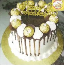  ??  ?? An anniversar­y cake