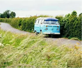  ??  ?? The trusty van parked by the roadside allowing the artists to explore the fields on the Lincolnshi­re/Cambridges­hire border.