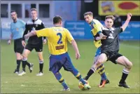  ??  ?? Glen Fell tussles with Loco’s Neil McLean. Photograph: Brianbat Photograph­y © 2016 Brian Battensby