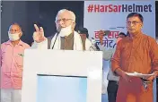  ?? HT PHOTO ?? Chief minister Manohar Lal Khattar addressing a gathering during the 'Har Sar Helmet' programme in Karnal on Saturday.