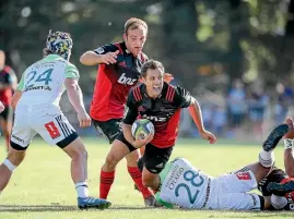  ?? PHOTO: GETTY IMAGES ?? Tim Bateman, pictured in action against the Highlander­s in the trial match in Darfield last month, started for the Crusaders when they last won a Super Rugby title in 2008.