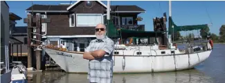  ??  ?? Author Marc Edge has written five books while living on his boat, Markenurh, but the manager of the Riversbend Floating Home Village has told him that he must vacate the site by July 1.