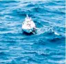  ?? AP ?? The distressed yacht, Thuriya, with Indian sailor Abhilash Tomy (right) on board, floats in the southern Indian Ocean. —