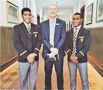  ?? Picture: SUPPLIED ?? Scots College, Sydney, Australia head of senior school Andrew Potter with Ratu Kadavulevu School students George Naqau, left, and Esava Ravouvou.