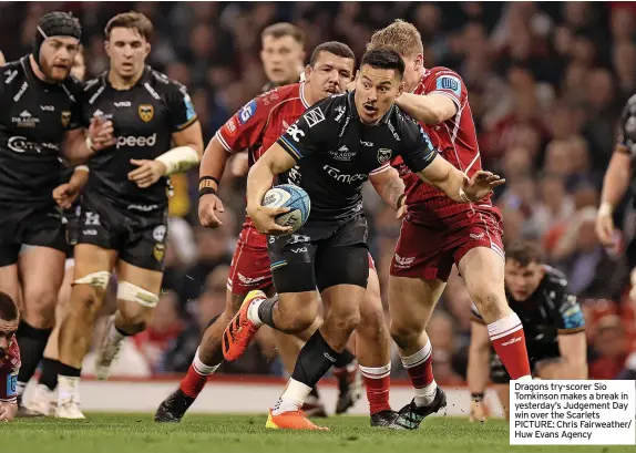  ?? ?? Dragons try-scorer Sio Tomkinson makes a break in yesterday’s Judgement Day win over the Scarlets PICTURE: Chris Fairweathe­r/ Huw Evans Agency