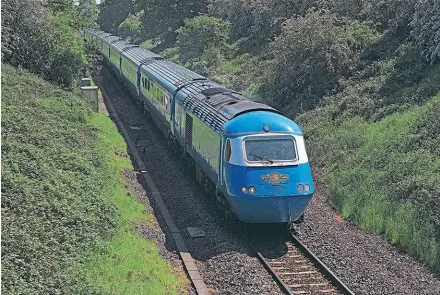  ?? ?? The Midland Pullman is one of four distinct offerings from the LS stable, offering top quality catering and comfortabl­e rolling stock for a clientele that has a relatively high disposable income and is eager to travel. Here the rebranded HST set passes Old Milverton on May 30, 2021, having worked the ‘Cornish Coastal Pullman’ from Eastleigh to Penzance the previous day. Rob Hodgkins/CC BY-SA 2.0